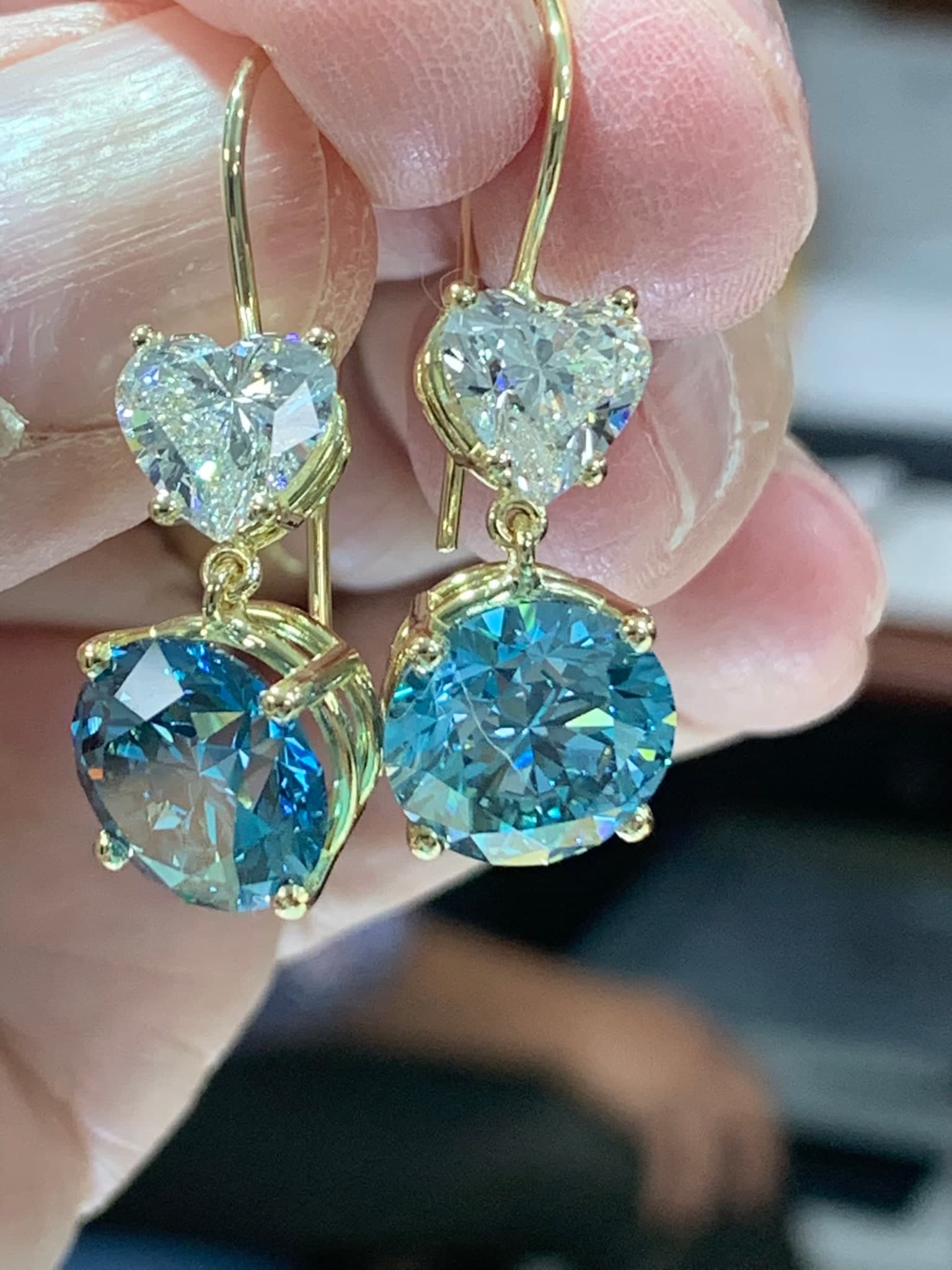 Heart-shaped diamond and round blue stone drop earrings